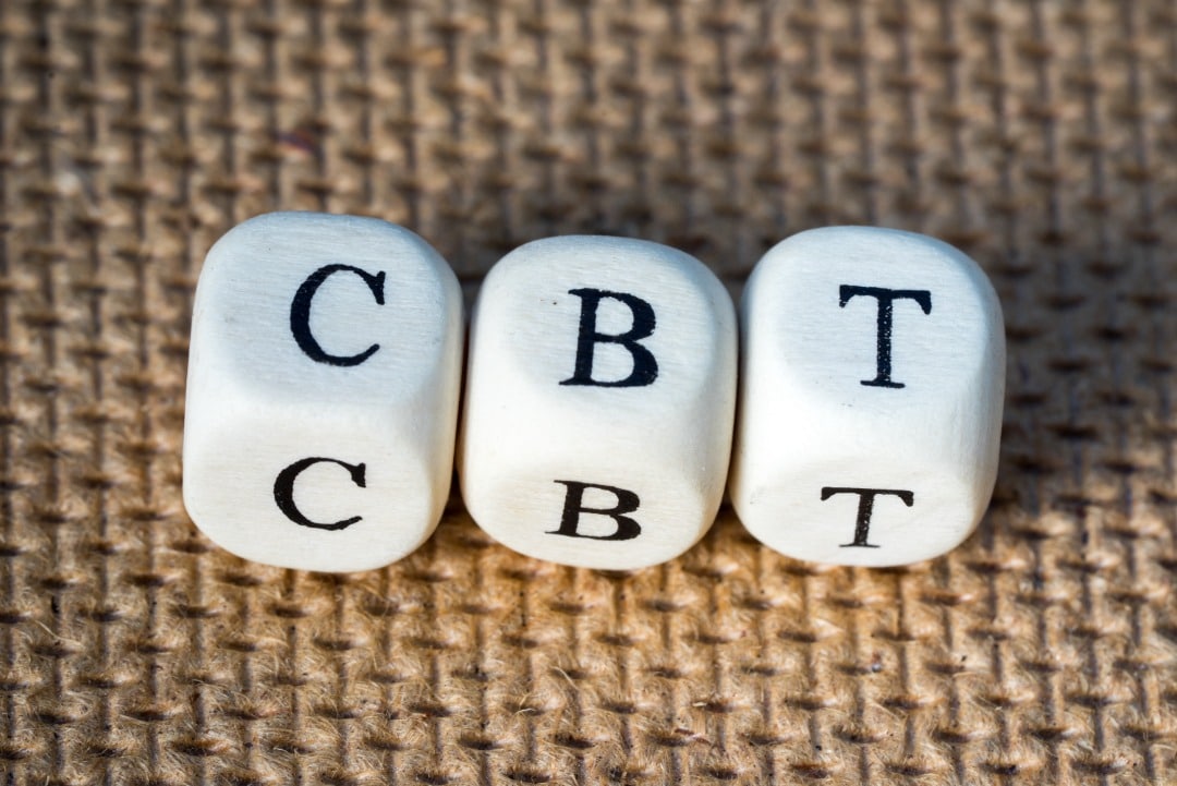 Wood blocks with the letters "CBT" on them.